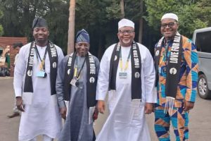 A Display of Unity: Dignitaries Share Commemorative Gift at 60th Jalsa Salana UK